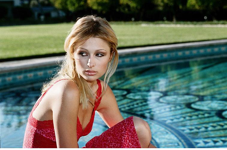 10P Paris Hilton exposing her nice tits and her pussy upskirt paparazzi pictures and