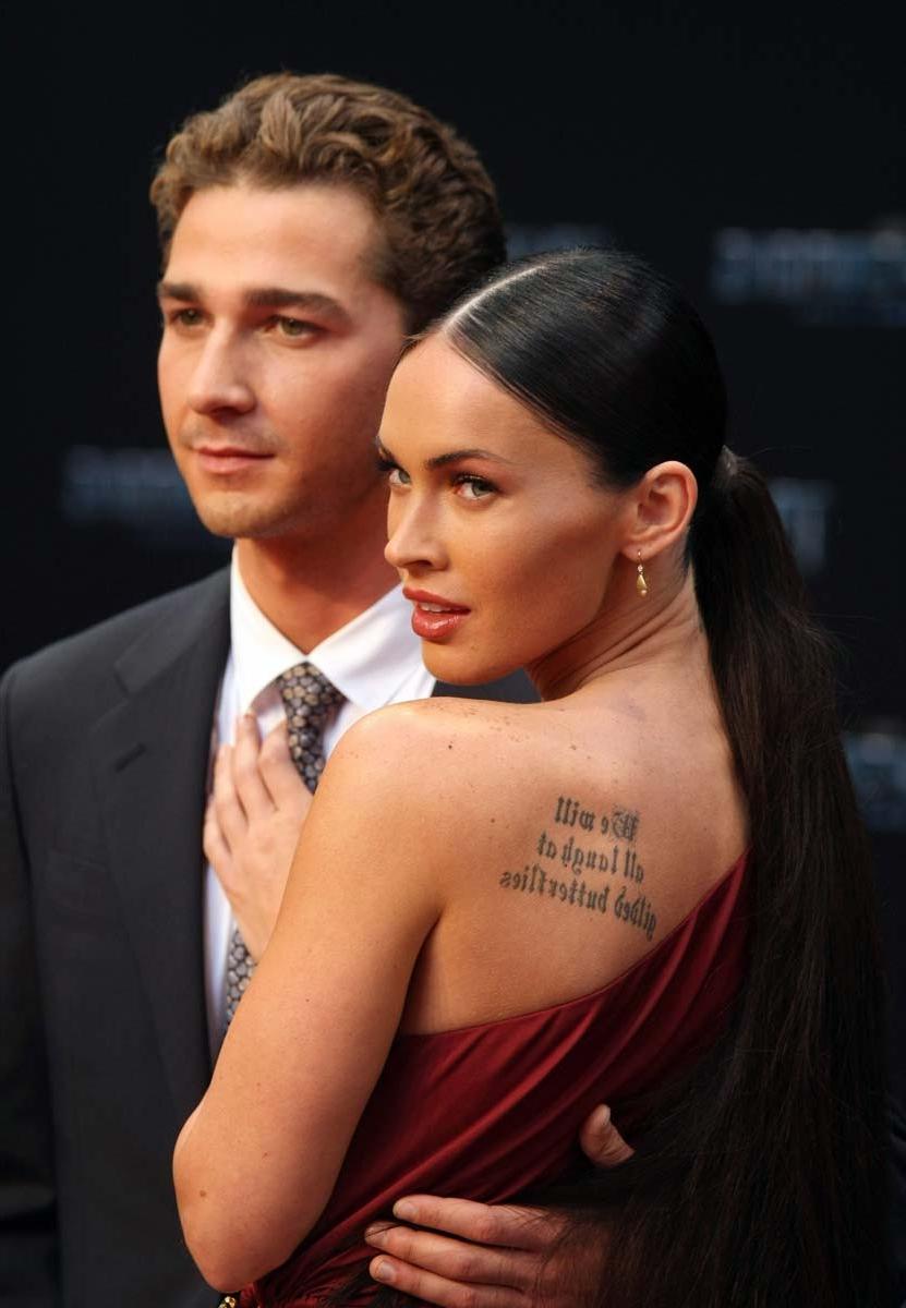 15P Megan Fox flaunting perky cleavage in sexy dress