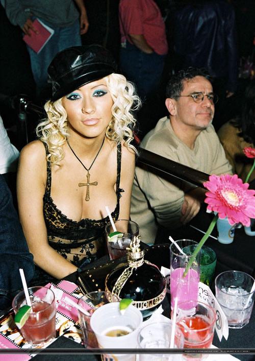 16P Christina Aguilera showing her nice big tits and posing very sexy