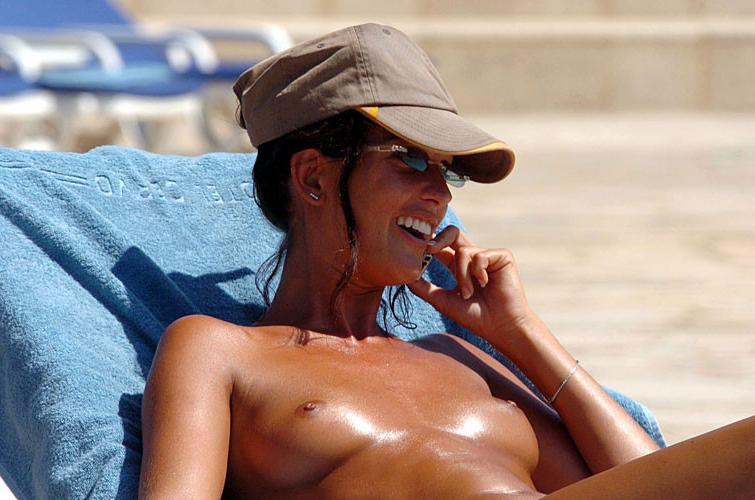10P Alessia Merz showing her nice big tits and upskirt paparazzi pictures
