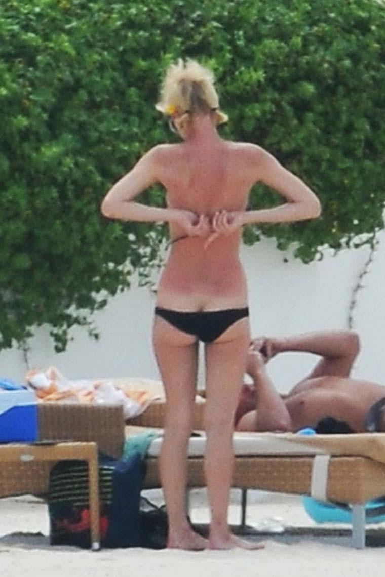 15P Paris Hilton showing her stunning nude ass