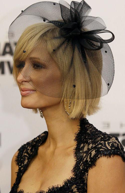 16P Paris Hilton looking very hot in some sexy lingerie and showing her ass and puss