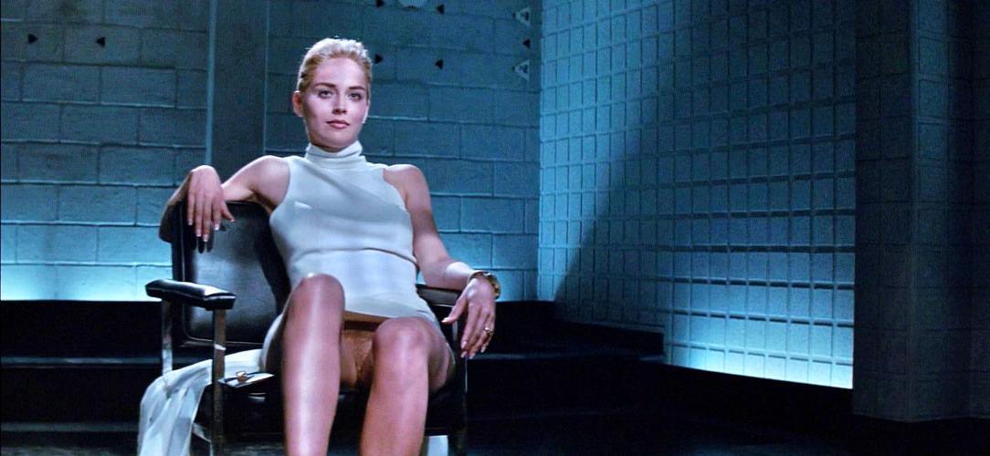16P Sharon Stone showing her nice pussy upskirt on chair and her nice big tits papar