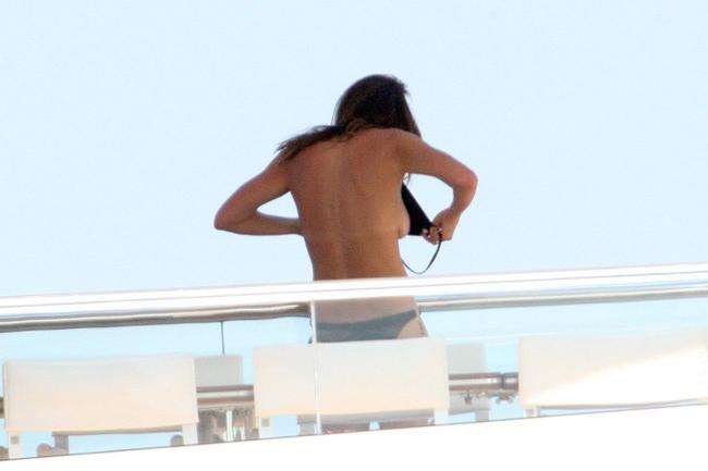 15P Cindy Crawford sunbathing nude topless on a yacht