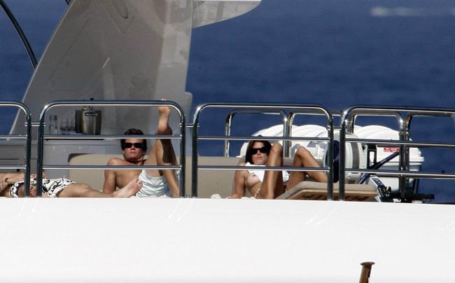 15P Cindy Crawford sunbathing nude topless on a yacht