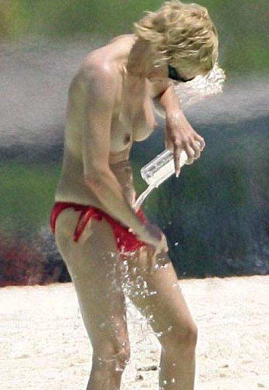 15P Sharon Stone cold water on her wet hairy pussy