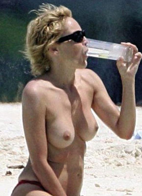 15P Sharon Stone cold water on her wet hairy pussy
