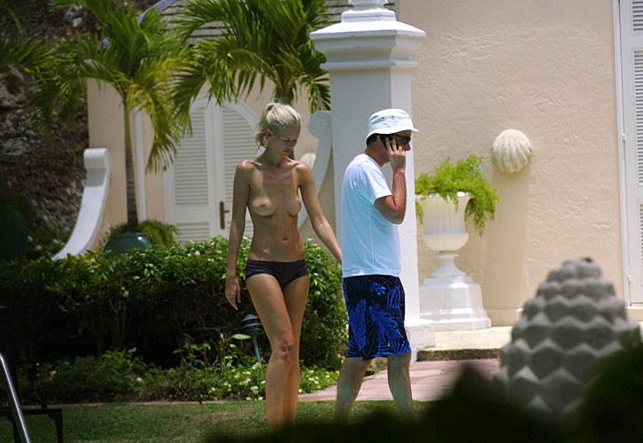 16P Claudia Schiffer showing her nice tits topless paparazzi pictures