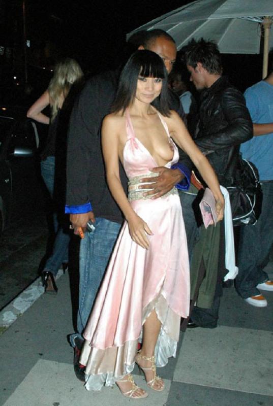 15P Bai Ling hard nipples and expose her tits