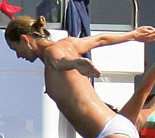 15P Celebrity Kate Moss posing and showing her small tits