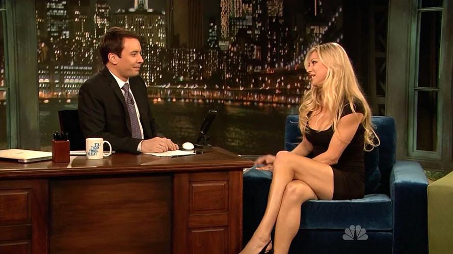 16P Anna Kournikova showing her nice big tits on beach and her great legs