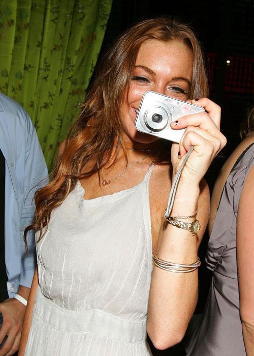 16P Lindsay Lohan nice sideboob paparazzi pictures and showing her big tits and upsk