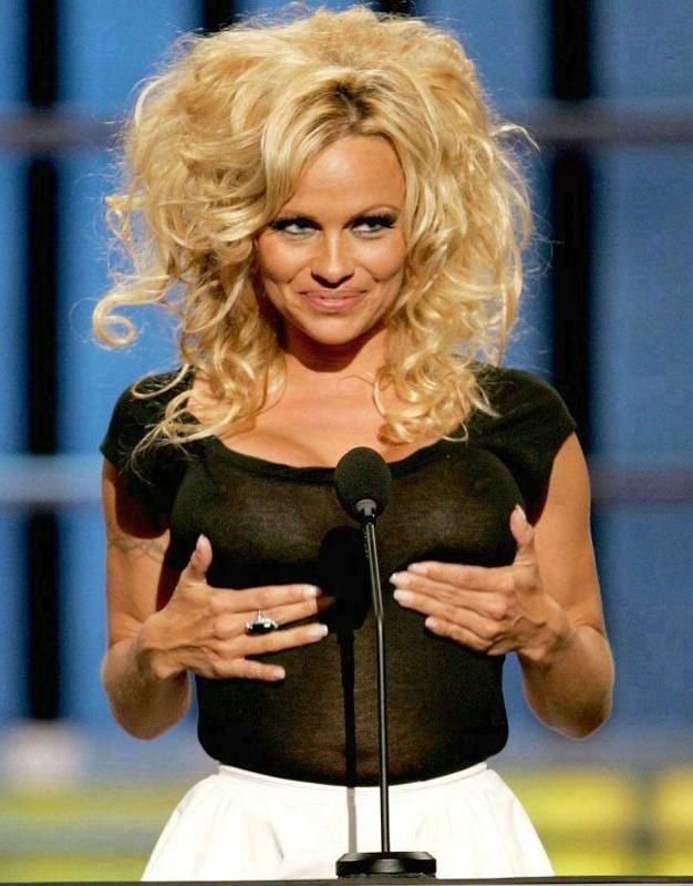 15P Celebrity Pamela Anderson touching her wet pussy
