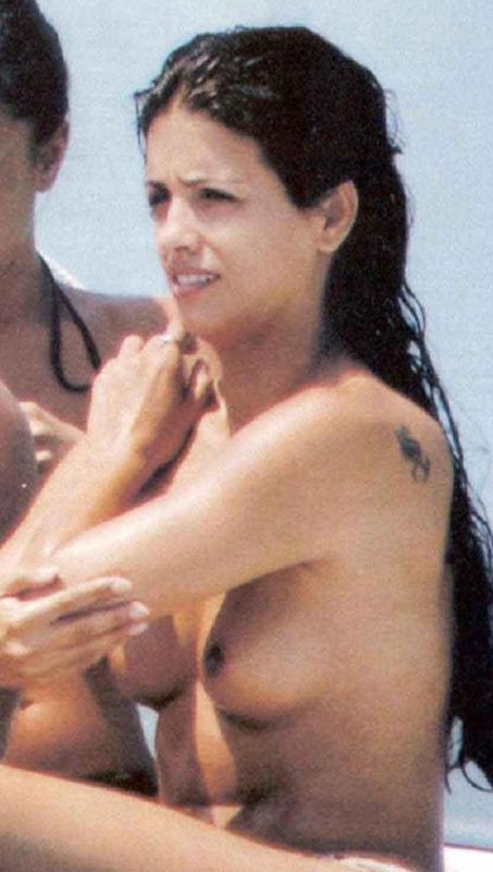 14P Celebrity Monica Cruz nude topless on the beach