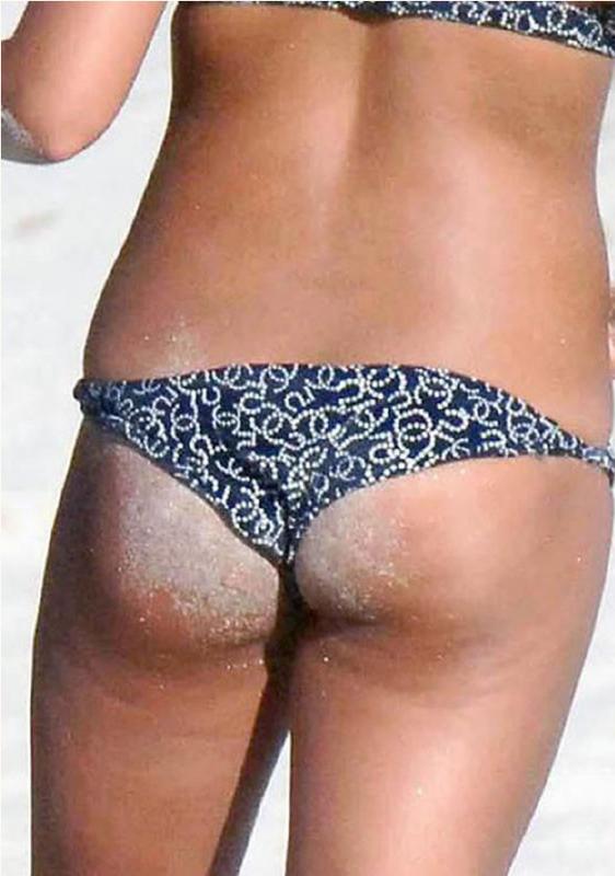 14P Celebrity Monica Cruz nude topless on the beach