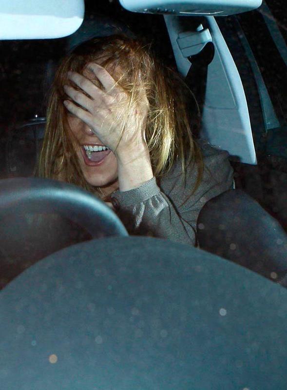 15P Celebrity Linday Lohan looking sexy and showing great legs