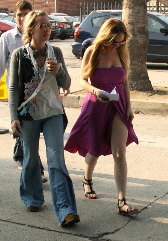 15P Celebrity Linday Lohan looking sexy and showing great legs