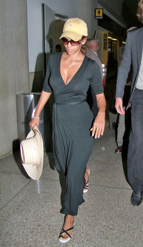 16P Halle Berry showing her nice big tits and ass in thong in see thru dress