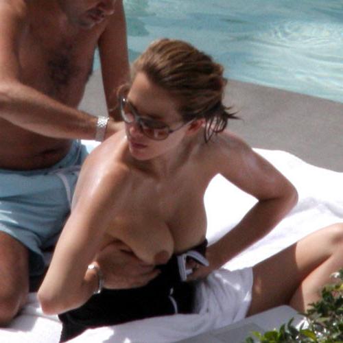 16P Melissa Theuriau showing her nice big tits on beach