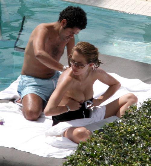 16P Melissa Theuriau showing her nice big tits on beach