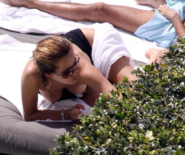 16P Melissa Theuriau showing her nice big tits on beach