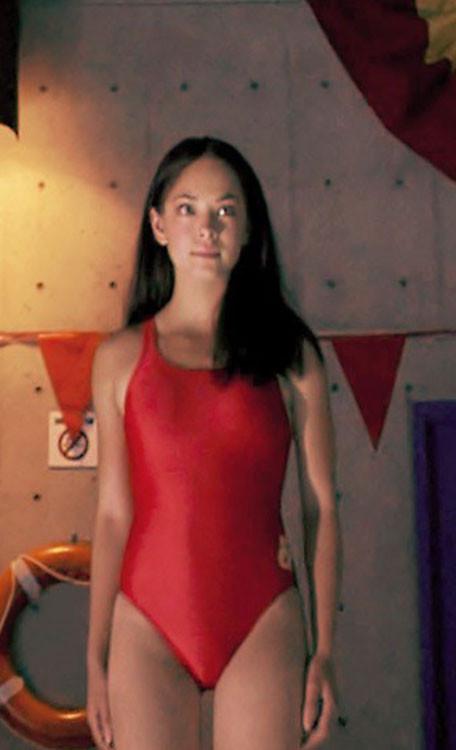 15P Celebrity Kristin Kreuk posing and showing great body