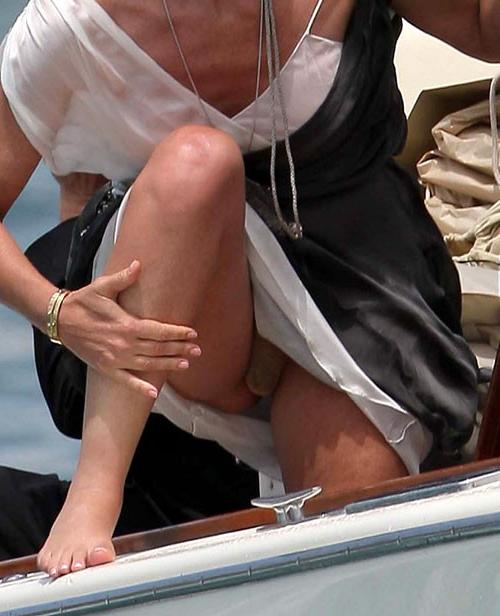 16P Sharon Stone showing her nice big tits on beach paparazzi pictures