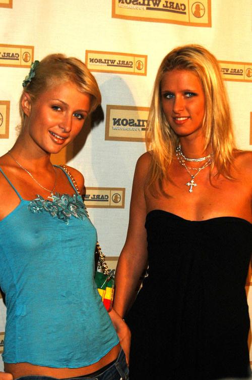 16P Paris Hilton showing her nice tits in see thru dress and her nice ass