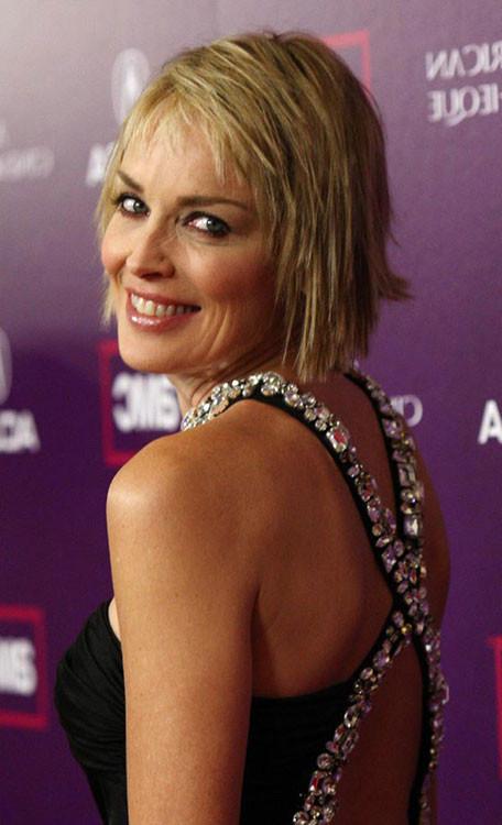 15P Celebrity Sharon Stone showing her very hot big boobs