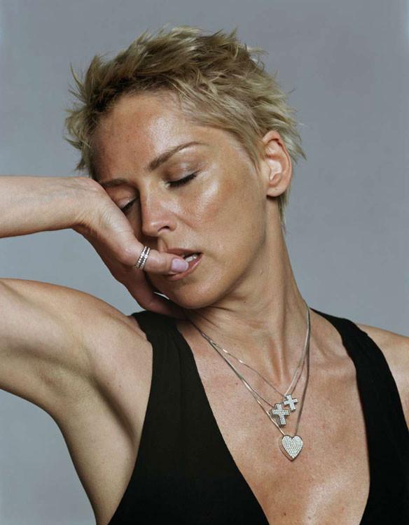 15P Celebrity Sharon Stone showing her very hot big boobs