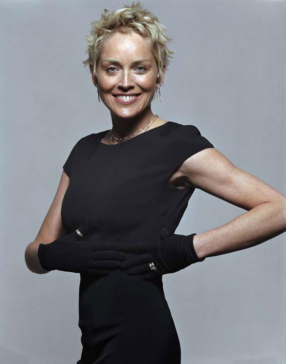 15P Celebrity Sharon Stone showing her very hot big boobs