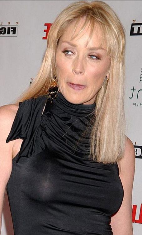 15P Celebrity Sharon Stone showing her very hot big boobs
