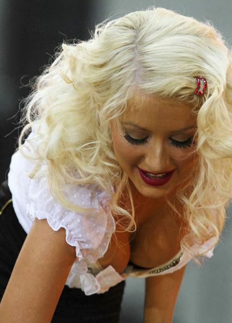 15P Celebrity singer Christina Aguilera performing in sexy fishnet