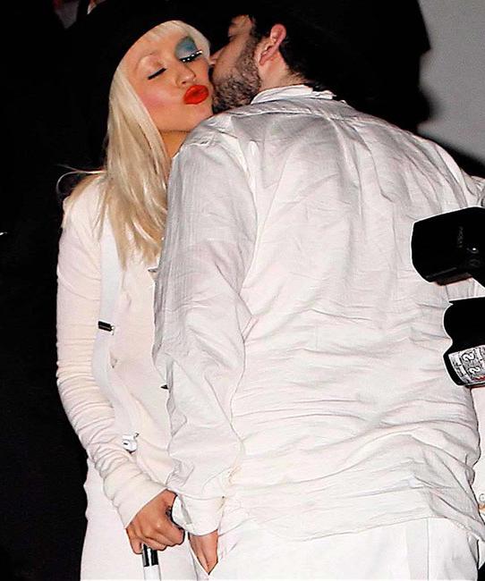 15P Celebrity singer Christina Aguilera performing in sexy fishnet