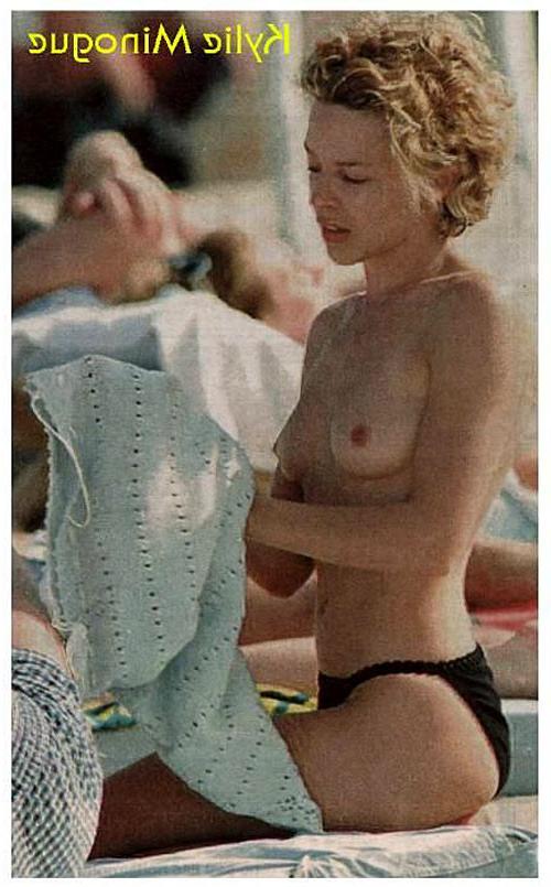 16P Kylie Minogue showing her nice small tits on beach