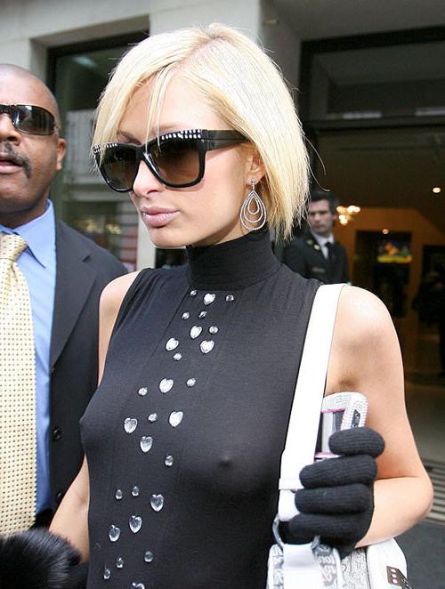 16P Paris Hilton showing her nice tits and pookies