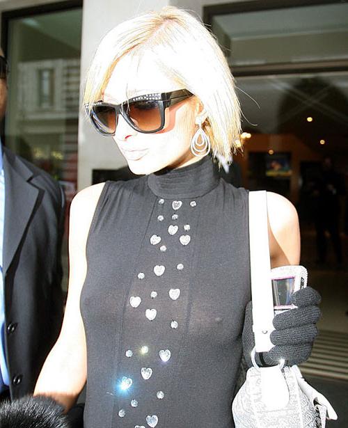 16P Paris Hilton showing her nice tits and pookies