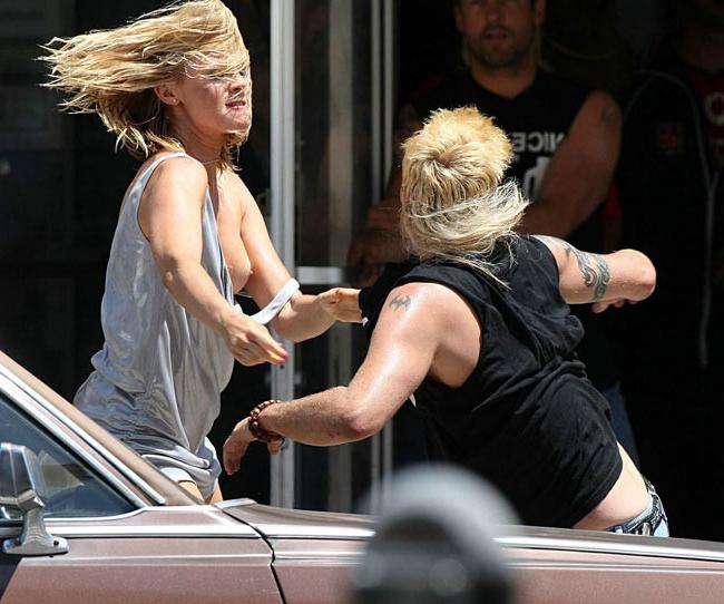 15P Celebrity hot babe Amy Smart nipple slip in public
