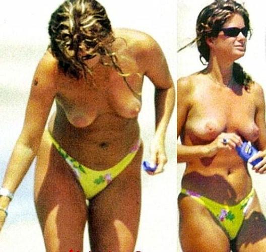 16P Rachel Hunter showing her nice big tits on beach