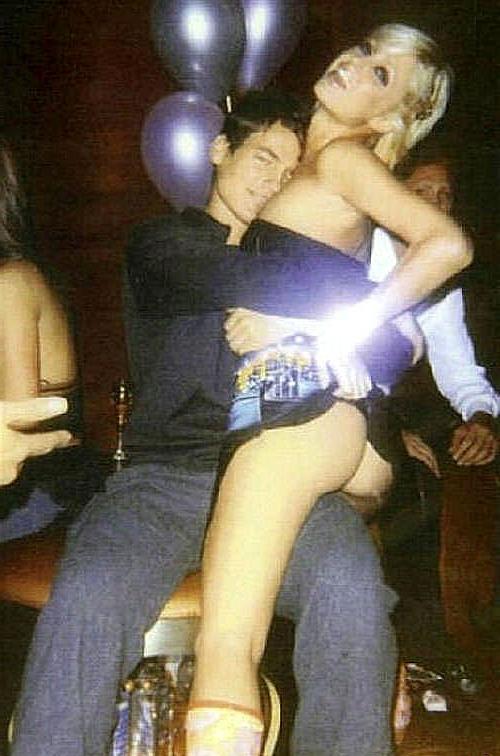 16P Paris Hilton showing her nice shaved pussy upskirt