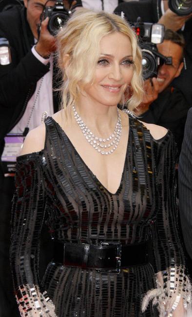 16P Celebrity Madonna totally naked and showing her hairy pussy