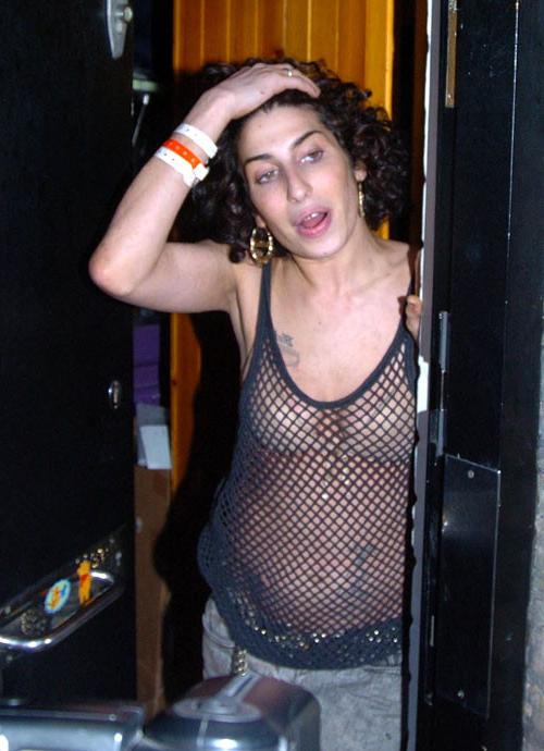 16P Amy Winehouse showing her nice big tits on beach