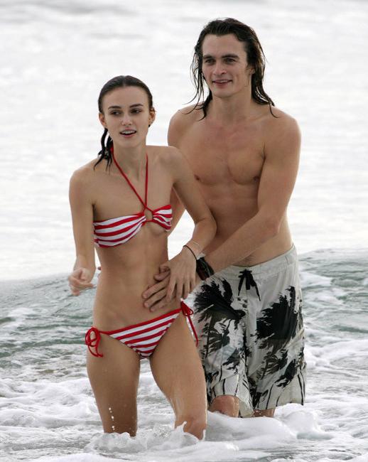 20P Amazing celebrity Keira Knightley nice nipple slip on the beach
