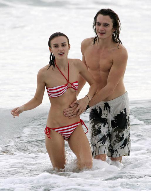 20P Amazing celebrity Keira Knightley nice nipple slip on the beach