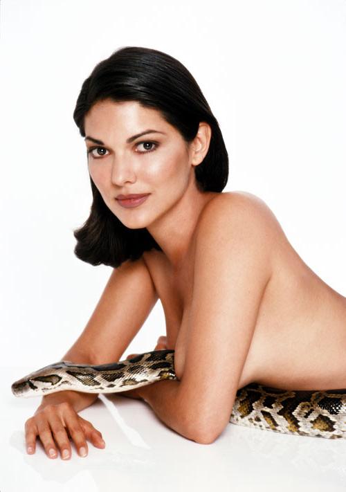 16P Laura Harring showing her big tits and posing nude