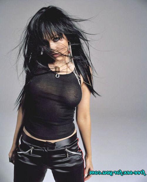 16P Christina Aguilera posing sexy in fishnet stocking