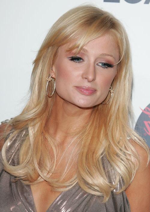 16P Paris Hilton showing her nice small tits on yacht