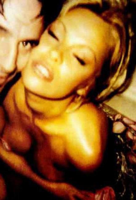 15P Celebrity with boobs Pamela Anderson sucking hard cock