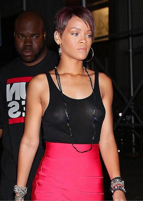 15P Celebrity black singer Rihanna wearing sexy see through dress