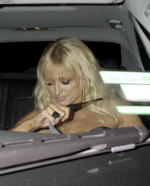 16P Paris Hilton showing her nice small tits on yacht